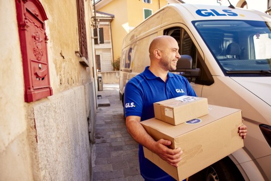 GLS driver scanning parcels