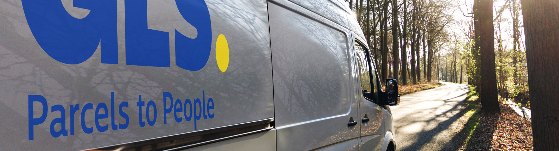 GLS van driving through rural area 